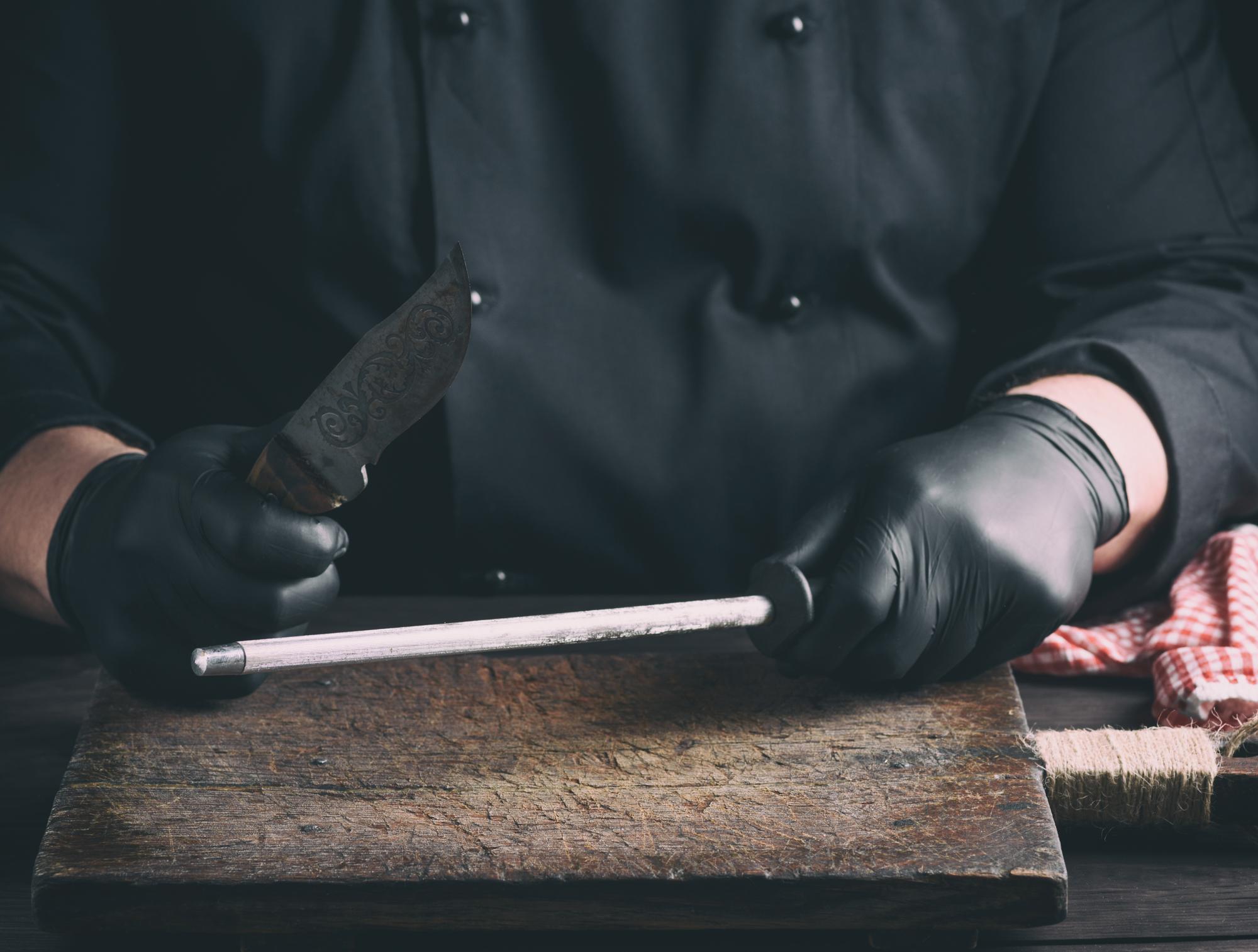 Instructor demonstrating knife skills